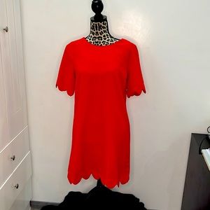 Red dress with scallop hem and scallop sleeves
